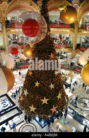 A christmas tree and decorations inside the Galeries Lafayette department store in Paris Stock Photo