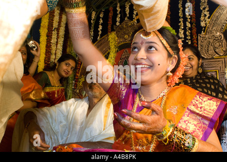 Stock image of traditional Hindu wedding in Hyderabad India with bride and groom touching foreheads Stock Photo