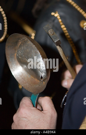 Beaten and worn pan being held during the Tinkers Parade La Fiesta de Caldereros Donostia San Sebastian Pais Vasco Spain Stock Photo