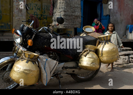 Stock image of milk delivery by motorcycle in Bundi Rajasthan India Stock Photo