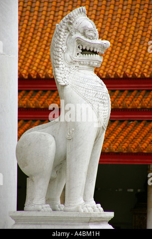 Marble lion or 'Singha' guarding Marble Temple, Wat Benchanmabophit, Bangkok Thailand Asia Stock Photo