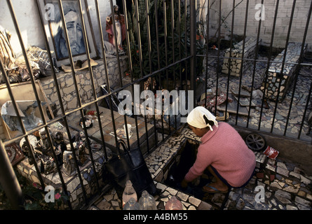 A shrine at Jardim de Saude (Garden of Health)  community, Sao Paul, Brazil.  Homeless families have invaded unused land to make temporary homes. Stock Photo