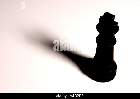 Chess piece black color king alone isolation shadow strength Stock Photo