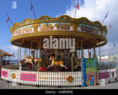 Funfair Carousel on the Palace Pier Brighton Sussex UK Stock Photo