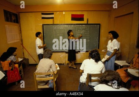 Boaco, Nicaragua, June 1981; An adult learner at the blackboard during an adult literacy campaign class being taught by a high school student. Stock Photo