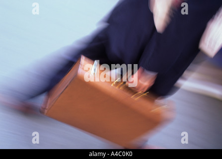 USA New York City NYC Manhattan Businessman in a Suit Carrying a Briefcase Stock Photo