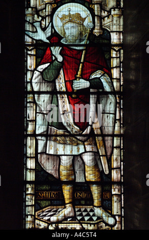 Stained-glass window of St. Oswald in St. Oswald's Church, Grasmere, Lake District, England, UK. Stock Photo