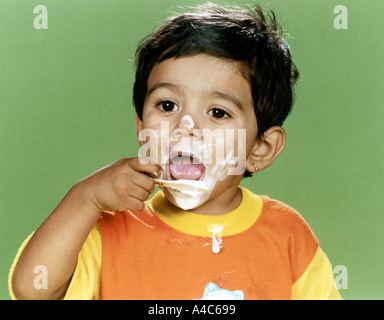 A little boy eating an ice cream Stock Photo