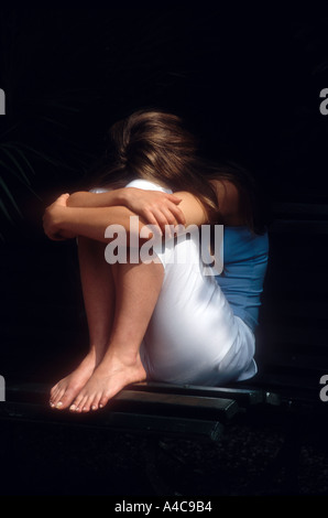 Exhaustion relax dreaming sleep concept. Tired girl sleeping. Young lady  resting in fetal position recovering in bed Stock Photo - Alamy