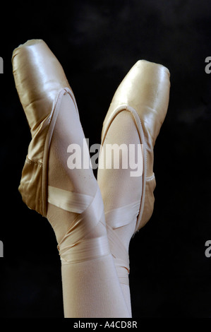 close up of a ballerina's foot in ballet shoes Stock Photo