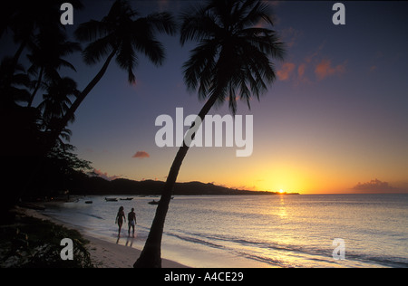 Sunset Couple on beach Grande Anse Grenada Stock Photo