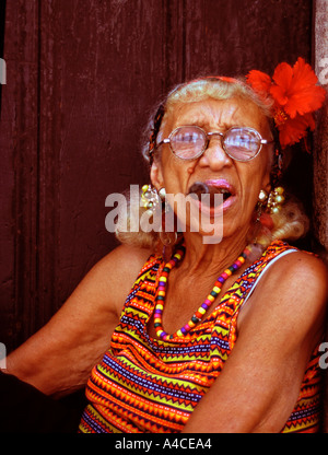 Cuban senora with cigar in Havana Cuba Stock Photo