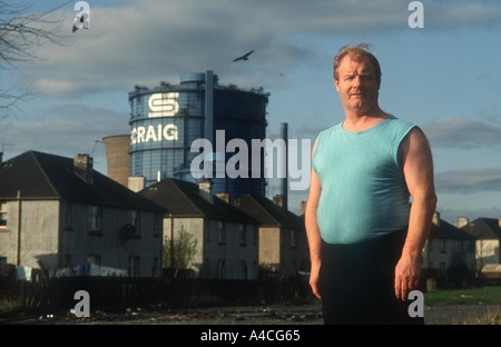 Motherwell, Scotland. A redundant steel-worker. Behind him Ravenscraig steel works, the town's main employer, is about to close, 1992. Stock Photo