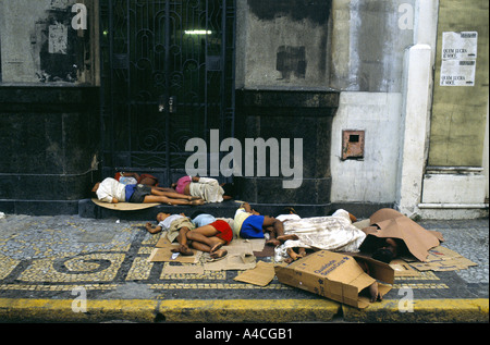 Recife, Brazil. Homeless children sleep on the street. Stock Photo