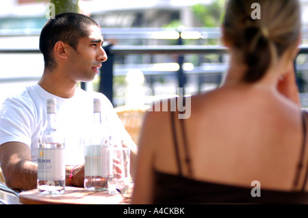 Royalty free photograph of British college university student drinking socializing in London cafe pub UK Stock Photo