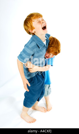Two boys brothers fighting Stock Photo