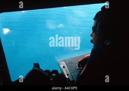 Iceberg Observer on USCG International Ice Patrol HC130 Hercules St Johns Newfoundland April 2001 Stock Photo