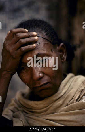 A WOMAN CRIES AS SHE REMEMBERS HER ELDEST SON KILLED  WHILE ON A VISIT  TO MASSAWA BY ETHIOPIAN AIR FORCE BOMBING. Stock Photo