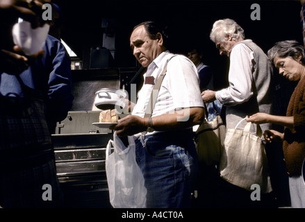 People queue for food supplies from Red Cross in Grbavica, Serb-controlled  Saravejo Stock Photo