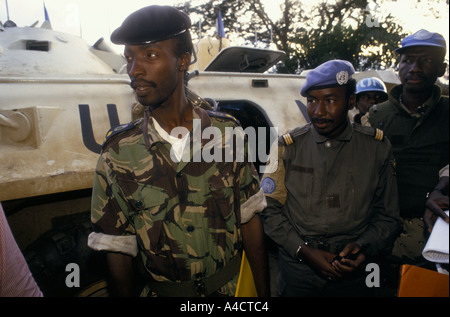 'RWANDAN CIVIL WAR', RPF NEGOTIATOR ABOUT TO ENTER THE UN ARMOURED PERSONNEL CARRIER OUTSIDE THE MERIDIAN HOTEL, Kigali, Stock Photo