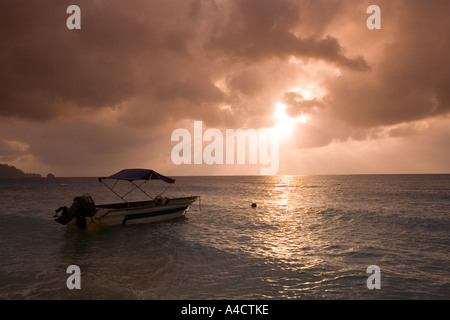 Malaysia Pulao Tioman Air Batang ABC village beach, woman sunbathing ...