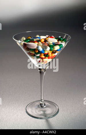 Martini glass of pills. Stock Photo