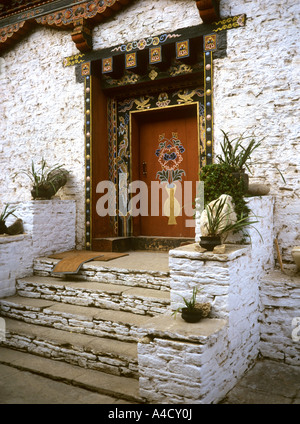 Bhutan Paro Gantey Palace Hotel decorated wooden doorway Stock Photo