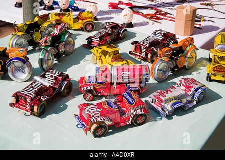 Toy vehicles made from used tin cans on a market stall in the Craft Market, Guardalavaca, Holguin Province, Cuba Stock Photo