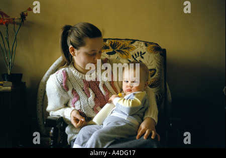 A 17 year old homeless mother with her child Stock Photo