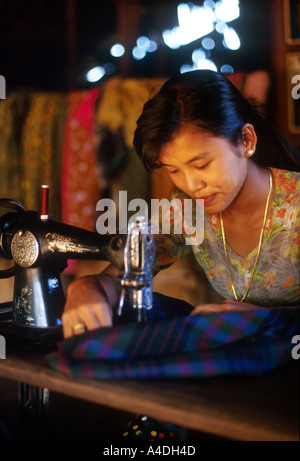 A seamstress working in a village in the Tenasserim region, Myanmar, Burma Stock Photo