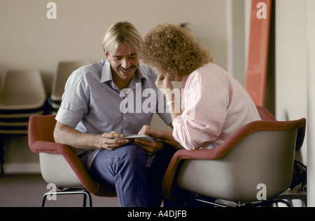 A man and a woman talking, Leyhill Open prison, Bristol, UK Stock Photo