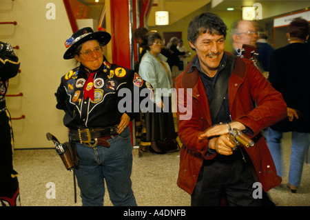 Fans practising their shooting skills at the Festival of Country and Western Music, Wembley Arena, London Stock Photo