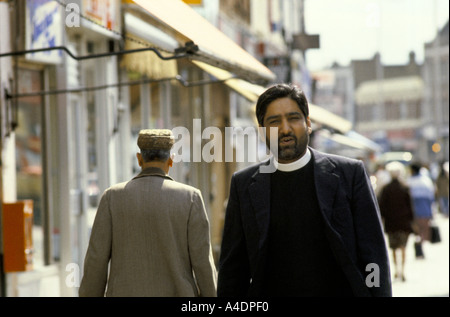 An Asian priest in Southall, London Stock Photo