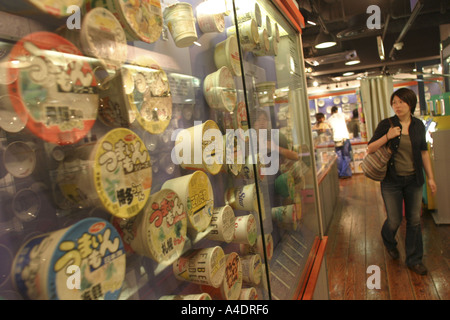 Young woman in ramen noodle hakubutsukan muesum in Shin Yokohama, near Tokyo, Japan. Stock Photo