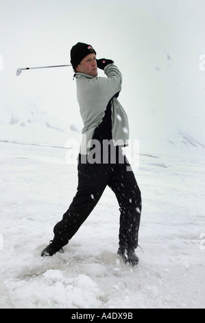 John Wells  - British winner of the 2004 Drambuie ice golf championship in Svalbard, Norway. Stock Photo