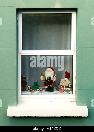 A little traditional window display in the window of a home in Ireland Stock Photo