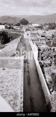 Travel Photography - A narrow straight lane in Trinidad in Cuba in Central Latin America. Landscape City Stock Photo