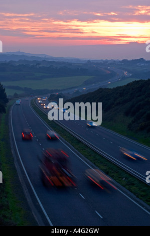 the sun sets over the a30 near redruth in cornwall,england Stock Photo