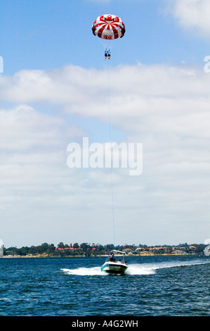 Para-sailing for two, high up under the clouds Stock Photo