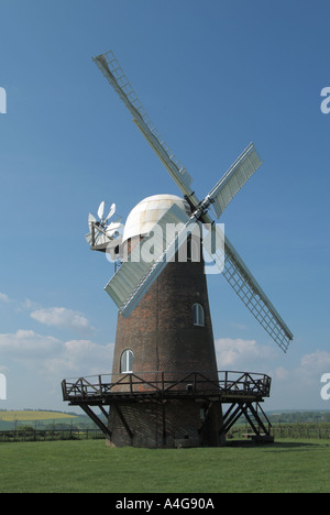 Restored Victorian historical Wilton windmill building with fantail & brick tower mill built 1821 between Wilton & Great Bedwyn Wiltshire England UK Stock Photo