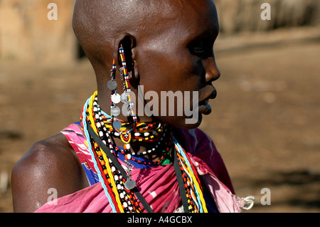 A Masai woman in the Masai Mara village of Kenya. Stock Photo