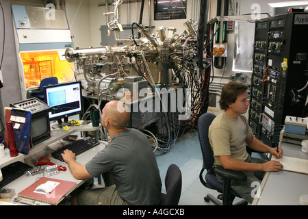 Graduate students working in molecular beam epitaxy lab at the Univeristy of California, Santa Barbara. Stock Photo