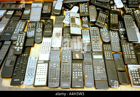 A variety of TV controllers for sale. Stock Photo