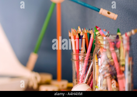 Colored pencils and kids toys Stock Photo