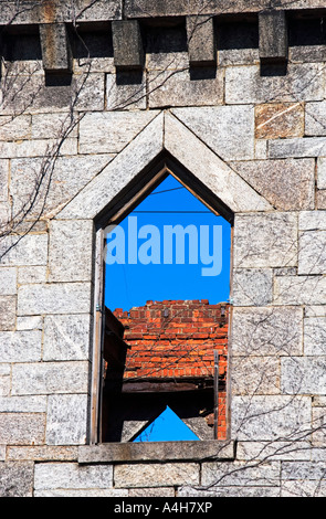 Very old window in brick stone wall of castle or fortress of 18th ...