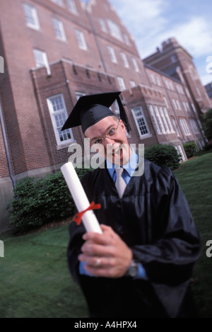 Celebrating Caucasian graduate Stock Photo