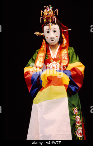 A Performer from the Pongsan Mask Dance Drama Troupe from Korea performing on Stage Stock Photo