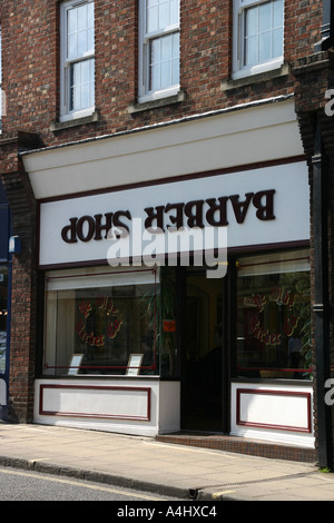 Barber Shop with upside down sign Winchester Stock Photo