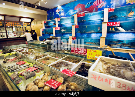 Live Fish and Shellfish in Tanks at a Chinese Seafood Restaurant Sai ...