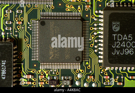 Close up computer printed circuit board and microprocessor chips Stock Photo